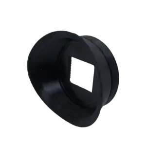 Black textured circular ring with a square central opening, positioned at an angle against a black background.