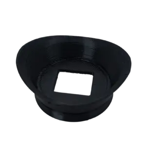 Black camera lens hood with a square rectangular cutout, attached to a lens (close-up).
