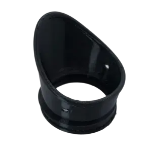 Close-up of a black flexible pipe connector with ridged edges viewed from above.
