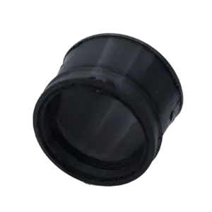 Close-up of a black camera lens barrel against a dark background.