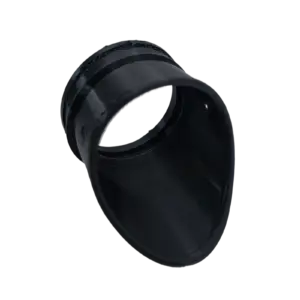 Close-up of a black camera lens barrel with ridged focus/zoom rings against a black background