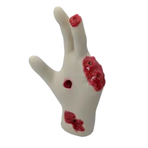 White silicone hand prop with bloody, exposed wounds on two fingertips and wrist area
